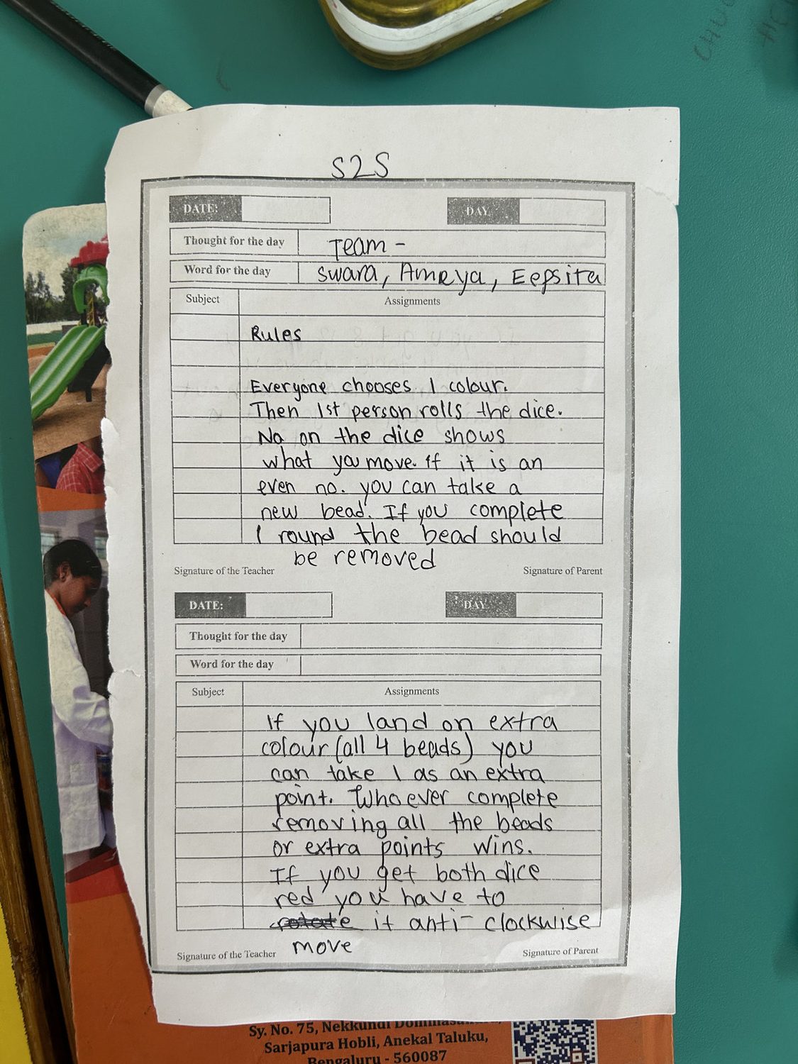 A team's handwritten rules for the game they designed in a Math Lab session