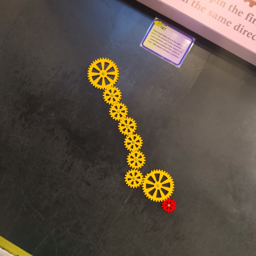 A gear and chain wall installation built by S2S