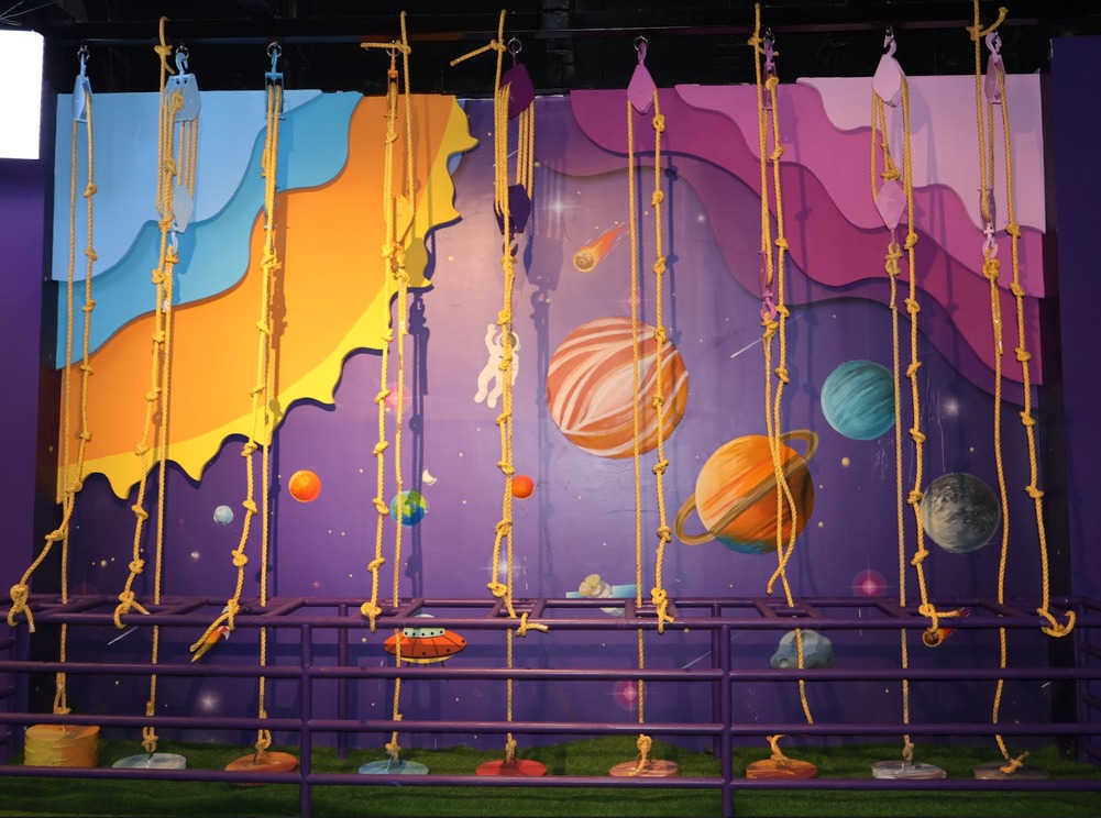 Model planets hanging from the ceiling of the space zone